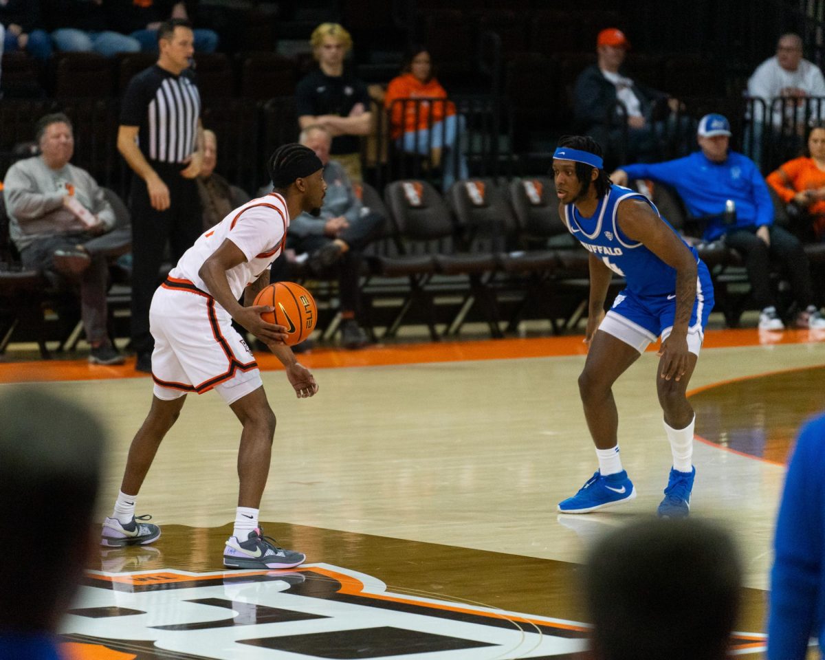 Bowling Green, OH- Falcons senior guard Trey Thomas (1) looks to take the ball past half-court against Buffalo at the Stroh Center in Bowling Green, Ohio.