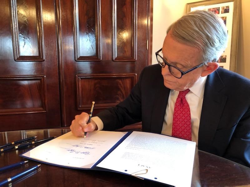 DeWine hosted a bill signing event featuring bills pertaining to college life and safety. (photo via the governor's official website)