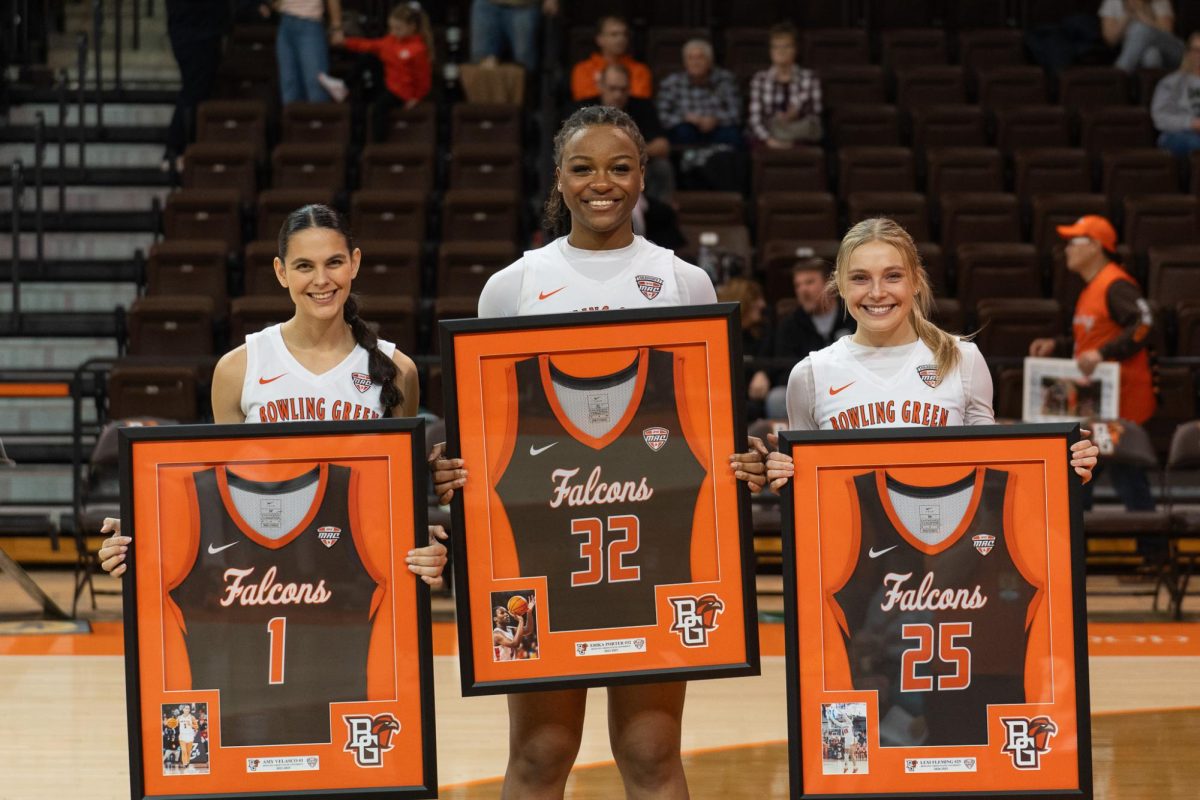 Bowling Green, OH- Falcon seniors Lexi Fleming (25), Erika Porter (32) and Amy Velasco (1) during the senior night festivities at the Stroh Center in Bowling Green, Ohio