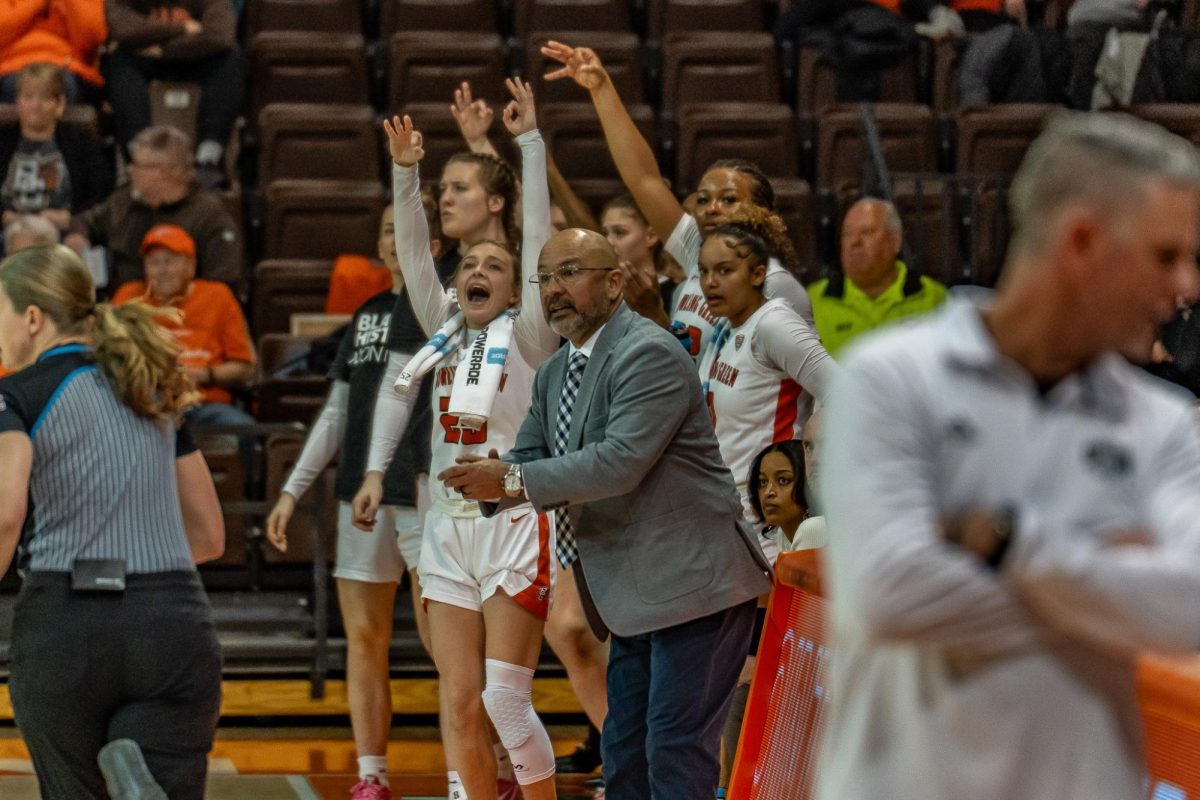 Bowling Green, OH- The Falcon bench cheers after another three-pointer at the Stroh Center in Bowling Green, Ohio