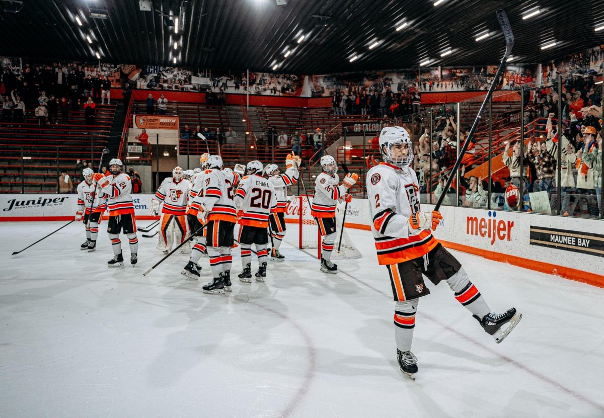 Bowling Green, OH – Falcons Men's Hockey Team celebrates a victory against the St. Thomas Tommies at Slater Family Ice Arena in Bowling Green, Ohio.