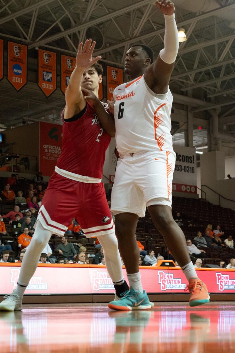 Bowling Green, OH - Falcons senior guard Marcus Johnson (6)creating space under the basket at the Stroh Center in Bowling Green, Ohio.