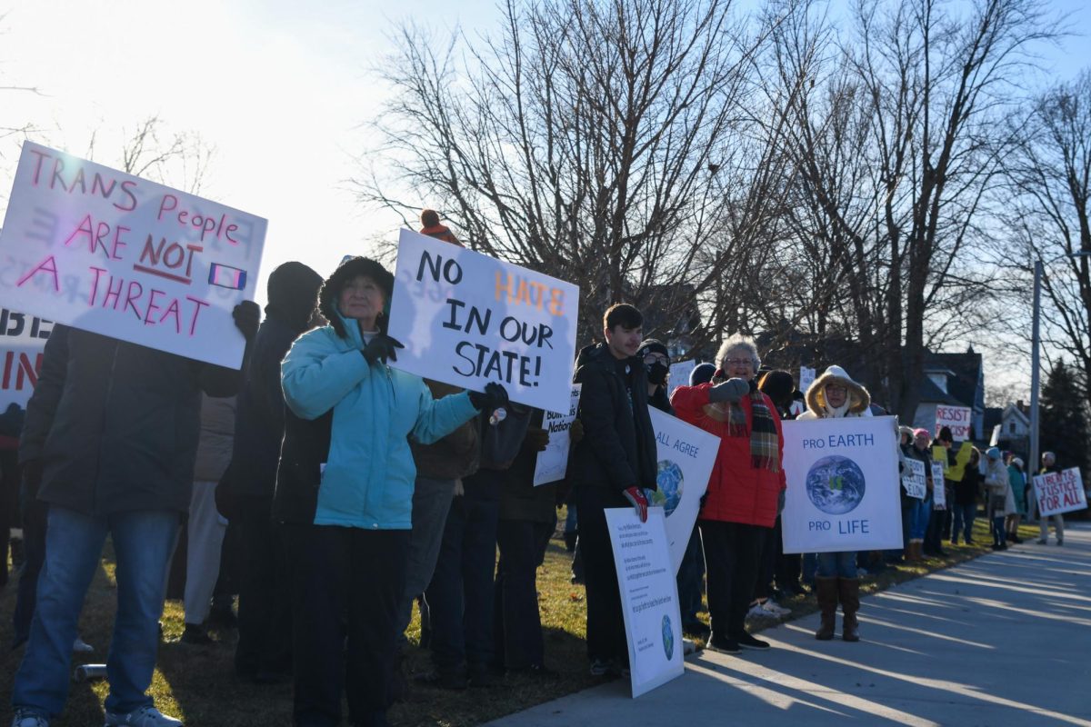 Protestors lined the streets of Bowling Green with handmade signs to protest.