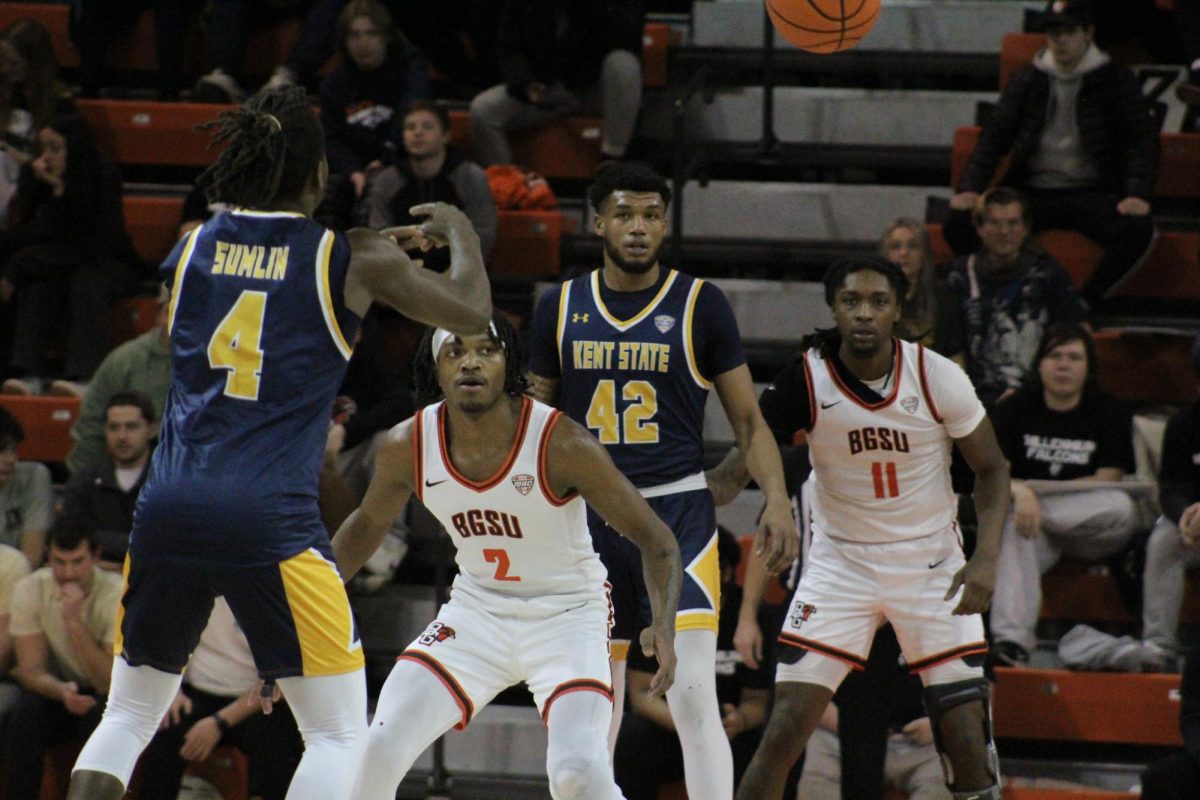 Bowling Green, OH - Falcons junior guard Javontae Campbell (2) and redshirt freshman forward Jamai Felt (11) on defense against the Golden Flashes at the Stroh Center in Bowling Green, Ohio.