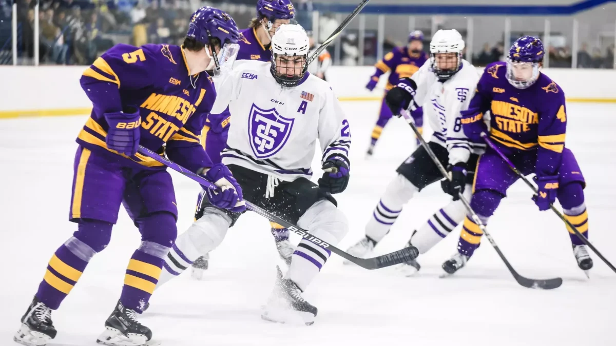 Minnesota State defend against Forward Cooper Gay