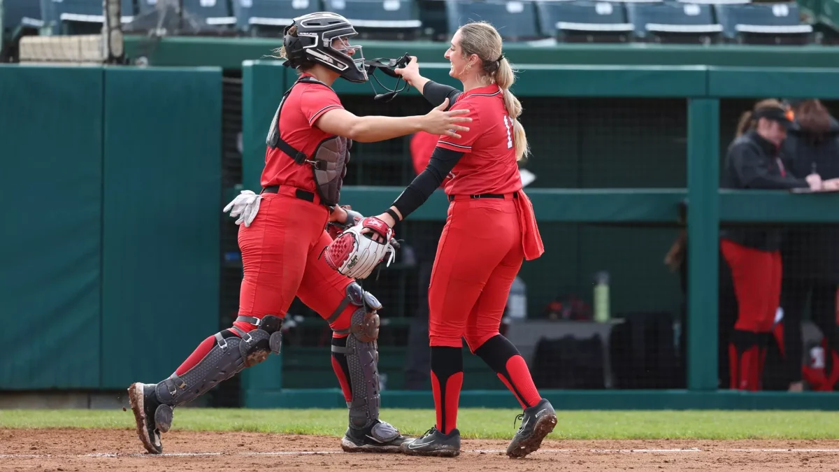 Pitcher Ella Whitney celebrating post game