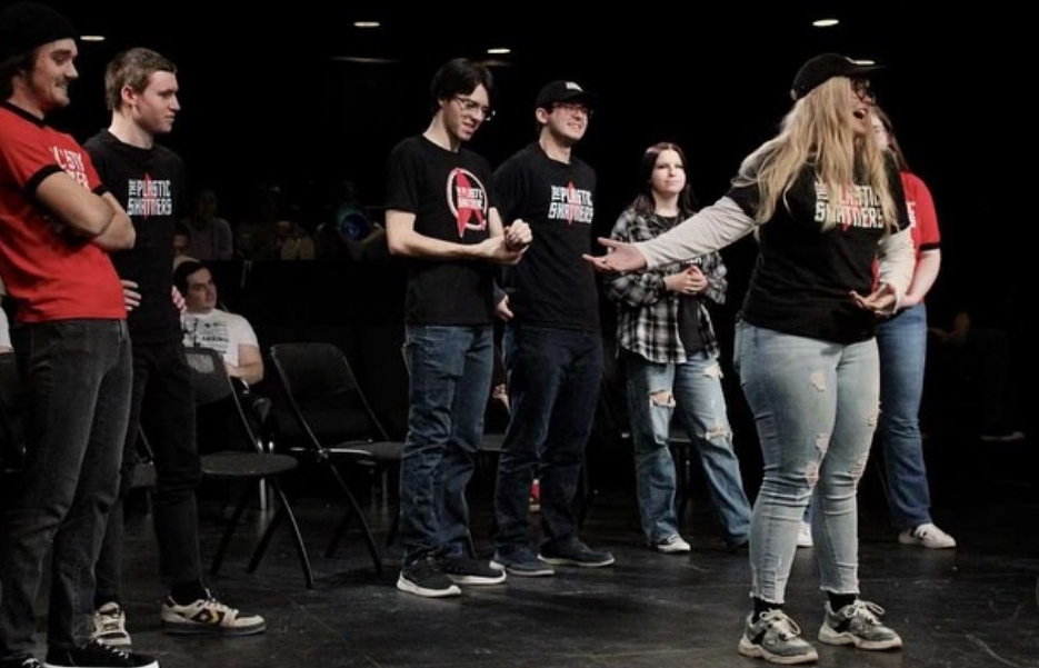 The Plastic Shatners at a recent improv performance (photo via the group's Instagram).