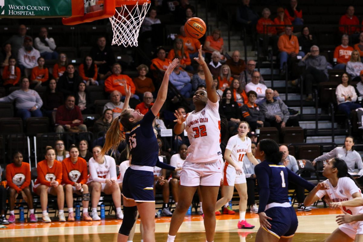 Bowling Green, Ohio- Falcons Fifth Year Forward Erika Porter (32) hooks a layup over her defender at the Stroh Center in Bowling Green, Ohio.