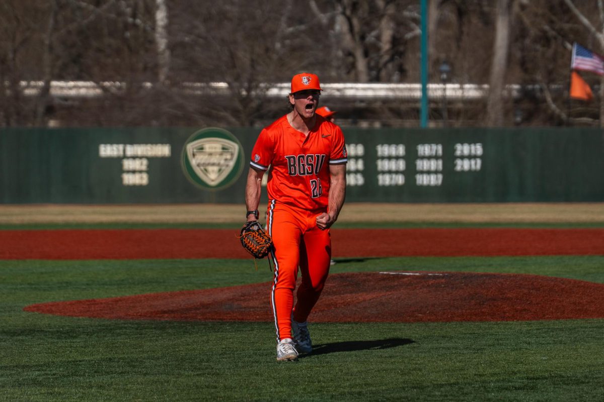 Athens, OH- Falcons redshirt freshman pitcher Titus Lotz (26) gets fired up after recording a save at Bob Wren Stadium in Athens, Ohio.