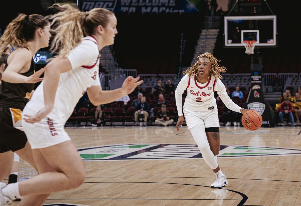 Cleveland, OH - Cardinals graduate forward Maliyah "MJ" Johnson (2) dribbles down the court to set the Cardinals up while on offense at Rocket Arena in Cleveland, Ohio.