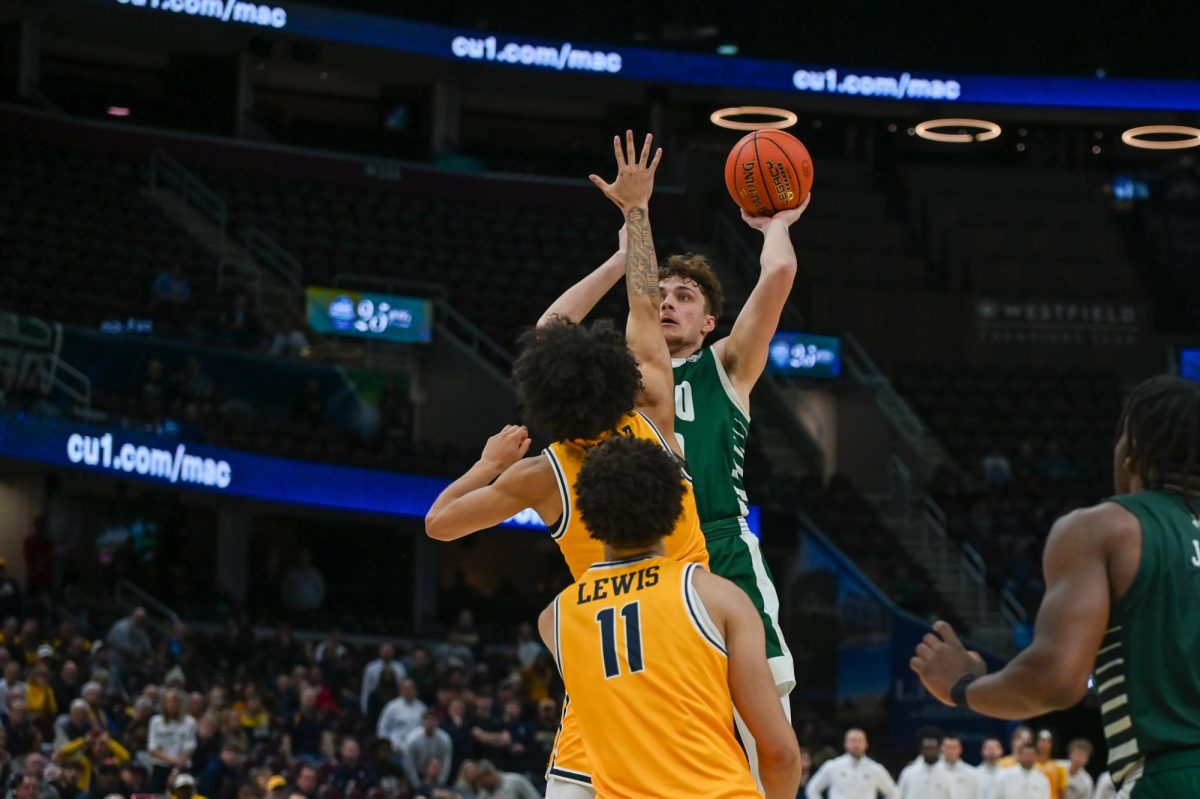 Cleveland, OH - Bobcats junior forward Aidan Hadaway (10) going up with a Rockets defender in his face at Rocket Arena in Cleveland, Ohio.