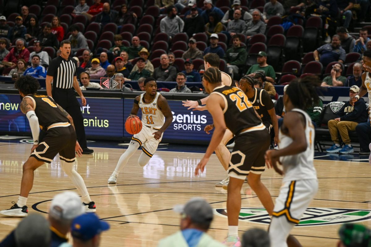 Cleveland, OH - Golden Flashes sophomore guard Cian Medley (11) charging through the Broncos defense at Rocket Arena in Bowling Green, Ohio.