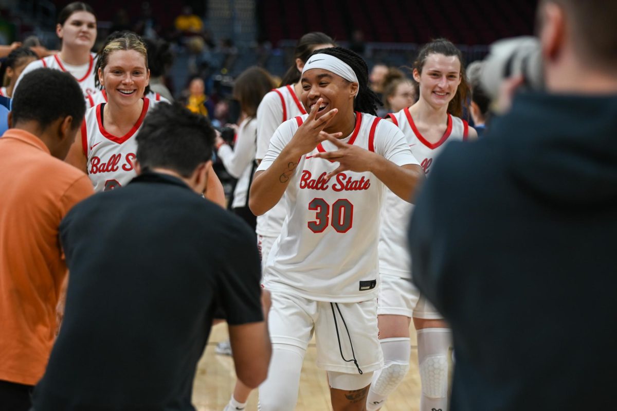 Cleveland, OH - Cardinals sophomore guard Hailey Smith (30) celebrating as the Cardinals advance to the MAC Tournament Championship at Rocket Arena in Cleveland, Ohio.