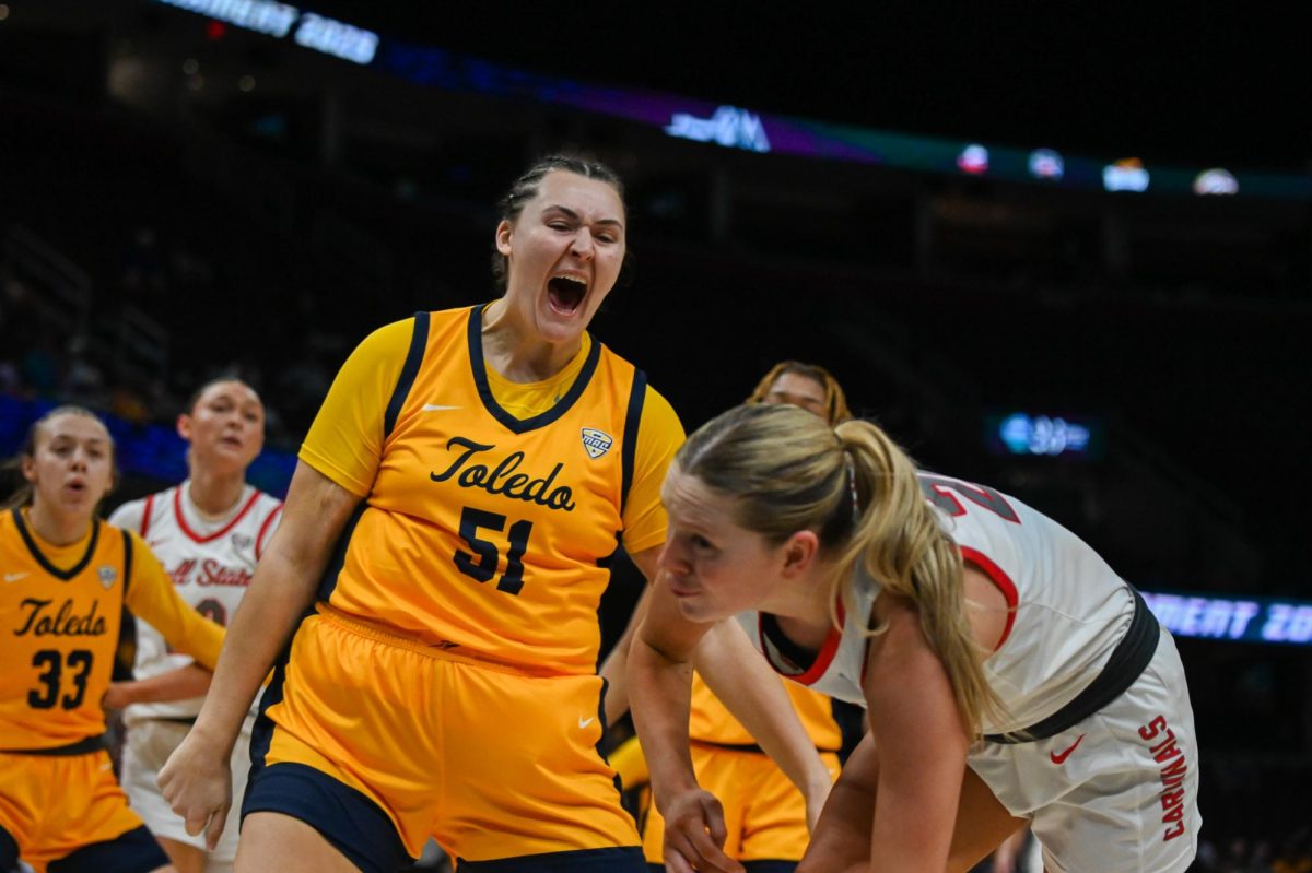 Cleveland, OH - Rockets graduate center Hannah Noveroske (51) celebrating a big block to stop the Cardinals at Rocket Arena in Cleveland, Ohio.