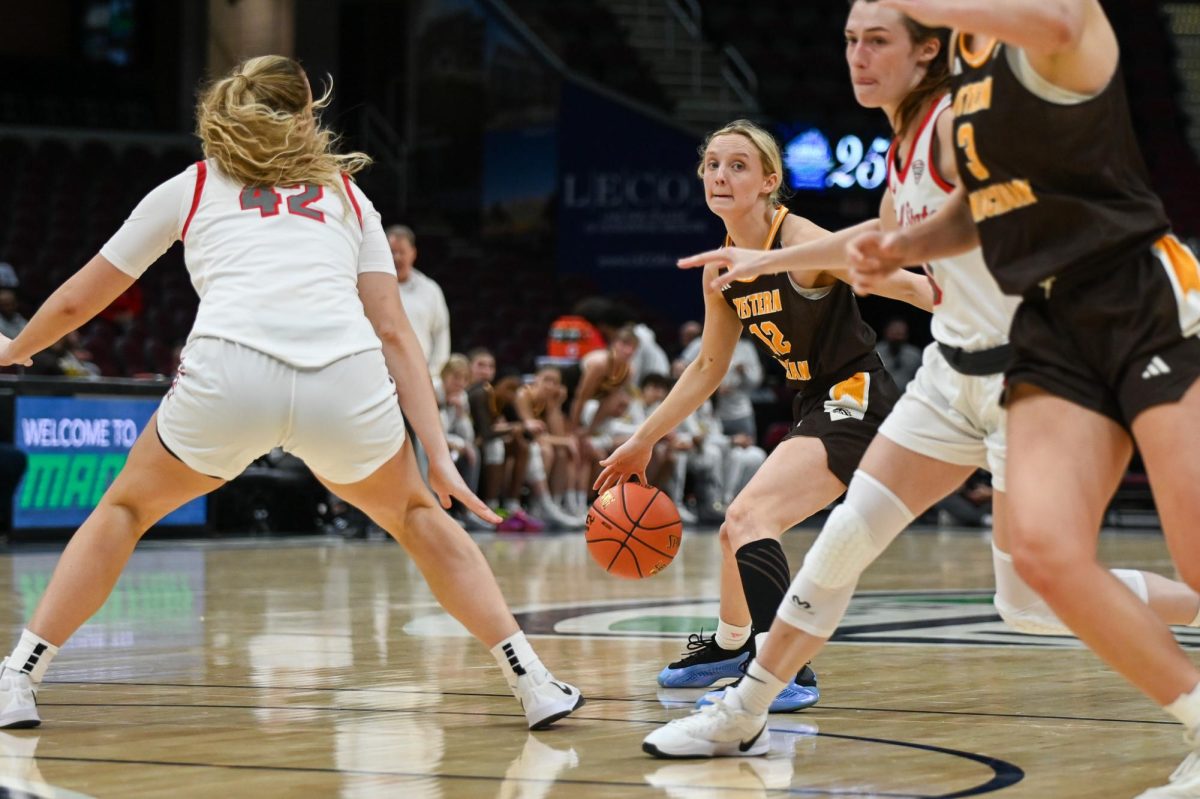 Cleveland, OH - Broncos junior guard Alli Carlson (12) trying to find a way through the Broncos defense at Rocket Arena in Cleveland, Ohio.