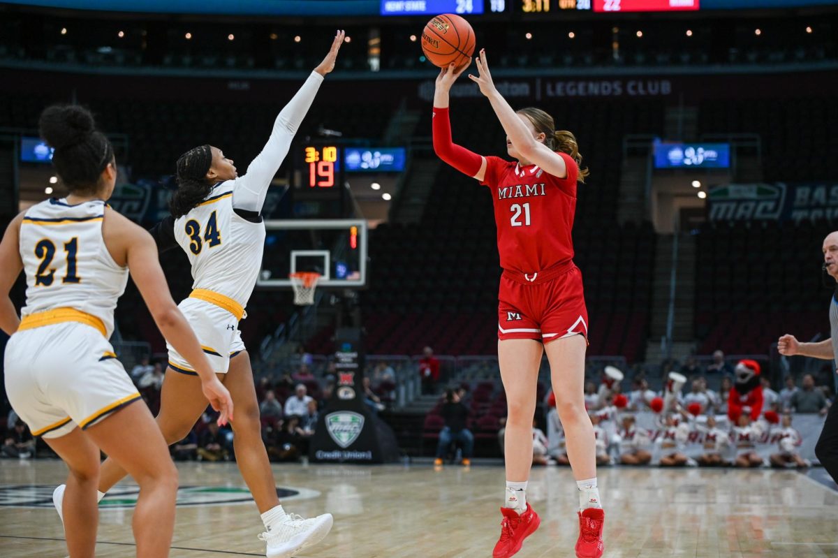 Cleveland, OH - Redhawks senior forward Isle de Vries (21) taking a three pointer at Rocket Arena in Cleveland, Ohio.