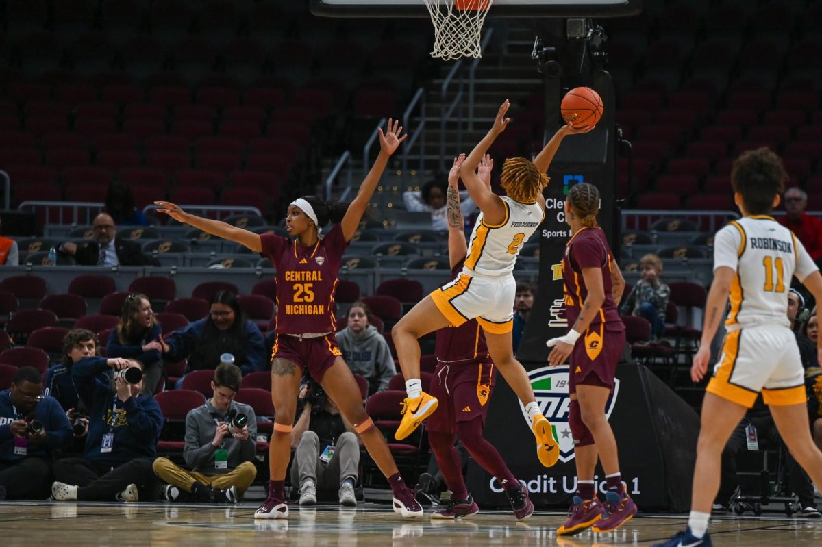 Cleveland, OH - Rockets freshman guard Faith Fedd-Robinson (2) going up for a tough shot in the key at Rocket Arena in Bowling Green, Ohio.