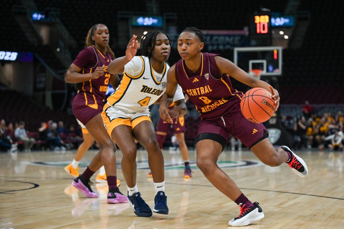 Cleveland, OH - Chippewas freshman guard Madi Morson (0) driving to the hoop at Rocket Arena in Bowling Green, Ohio.