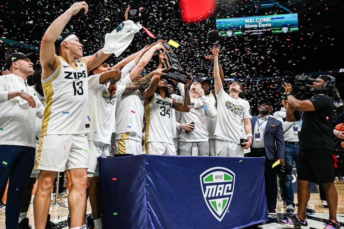 Cleveland, OH - Zips celebrating winning the MAC Basketball Championship at Rocket Arena in Cleveland, Ohio.