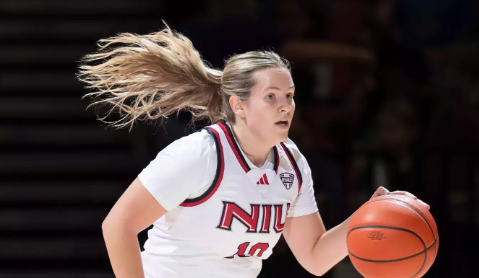 NIU point guard Chelby Koker dribbling up the court