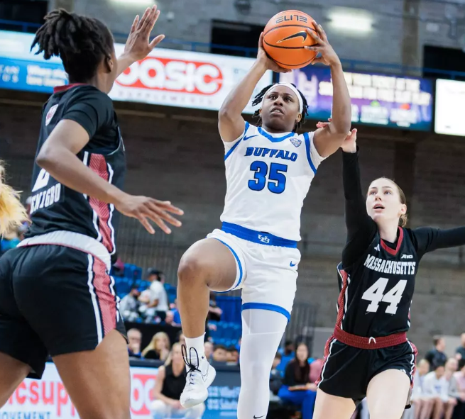 Buffalo redshirt senior guard Chellia Watson shooting a floater layup against Massachusetts in their WNIT second round win