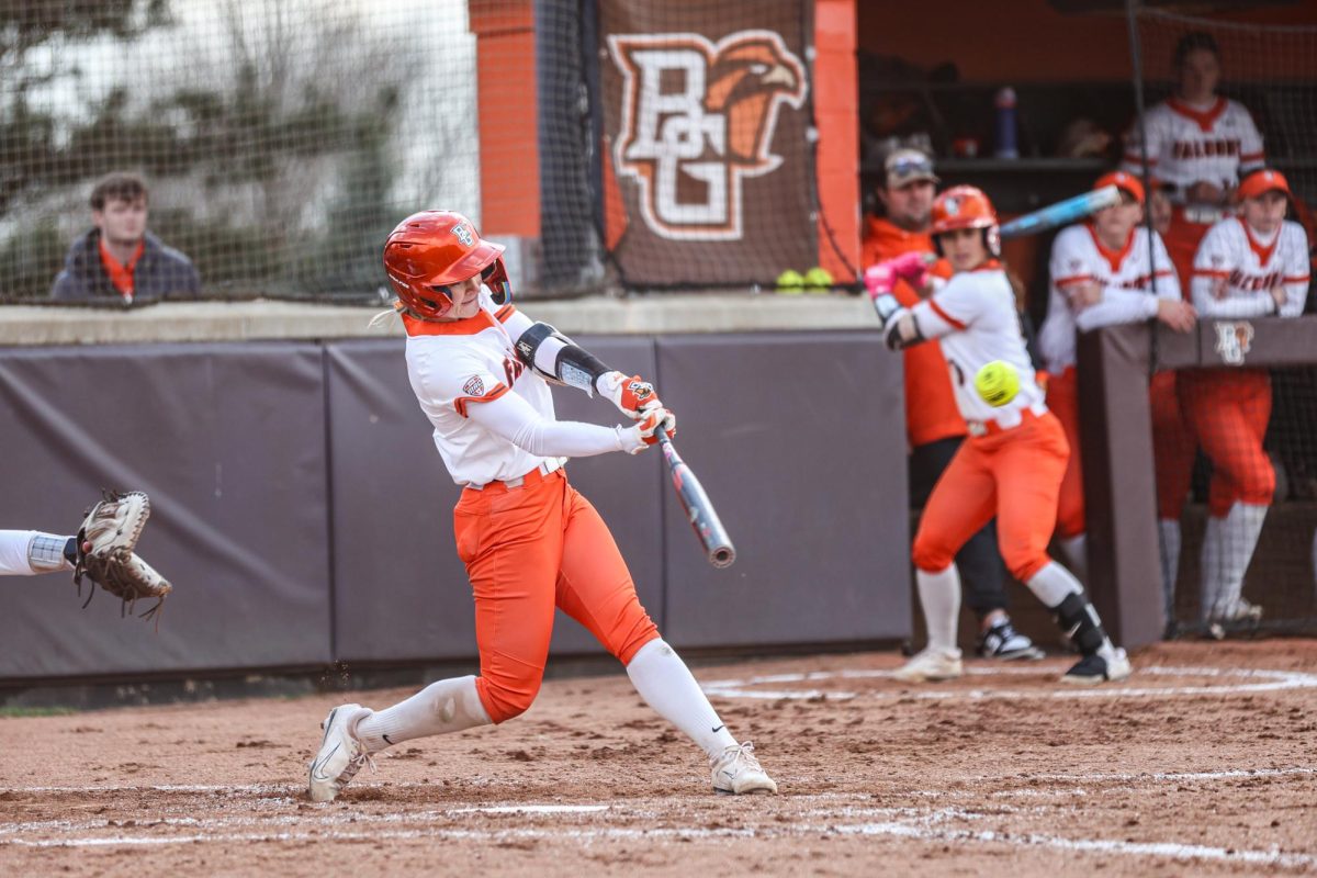 Bowling Green, OH - Falcons sophomore midfielder Taylor Behrendt (9) hits the ball in a contest against the Western Michigan Broncos at Meserve Field in Bowling Green, Ohio.