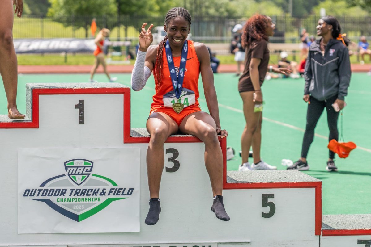 Athens, OH- Falcons sprinter Kiersten Franklin sits on the podium at Goldsberry Track in Athens, Ohio. 