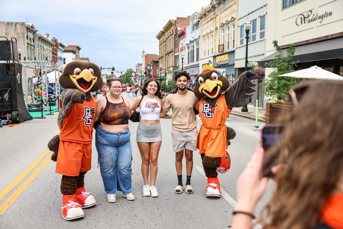 Bowling Green, OH - BGSU students pose with Freddie and Frieda at Rally BG on Main in Bowling Green, Ohio.