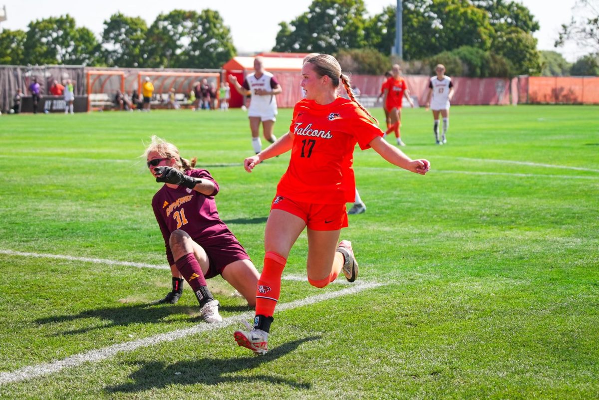 Bowling Green, OH - Falcons junior forward Lizzie Bultynck (17) shooting the ball and scoring against Central Michigan at Cochrane Stadium in Bowling Green, Ohio.