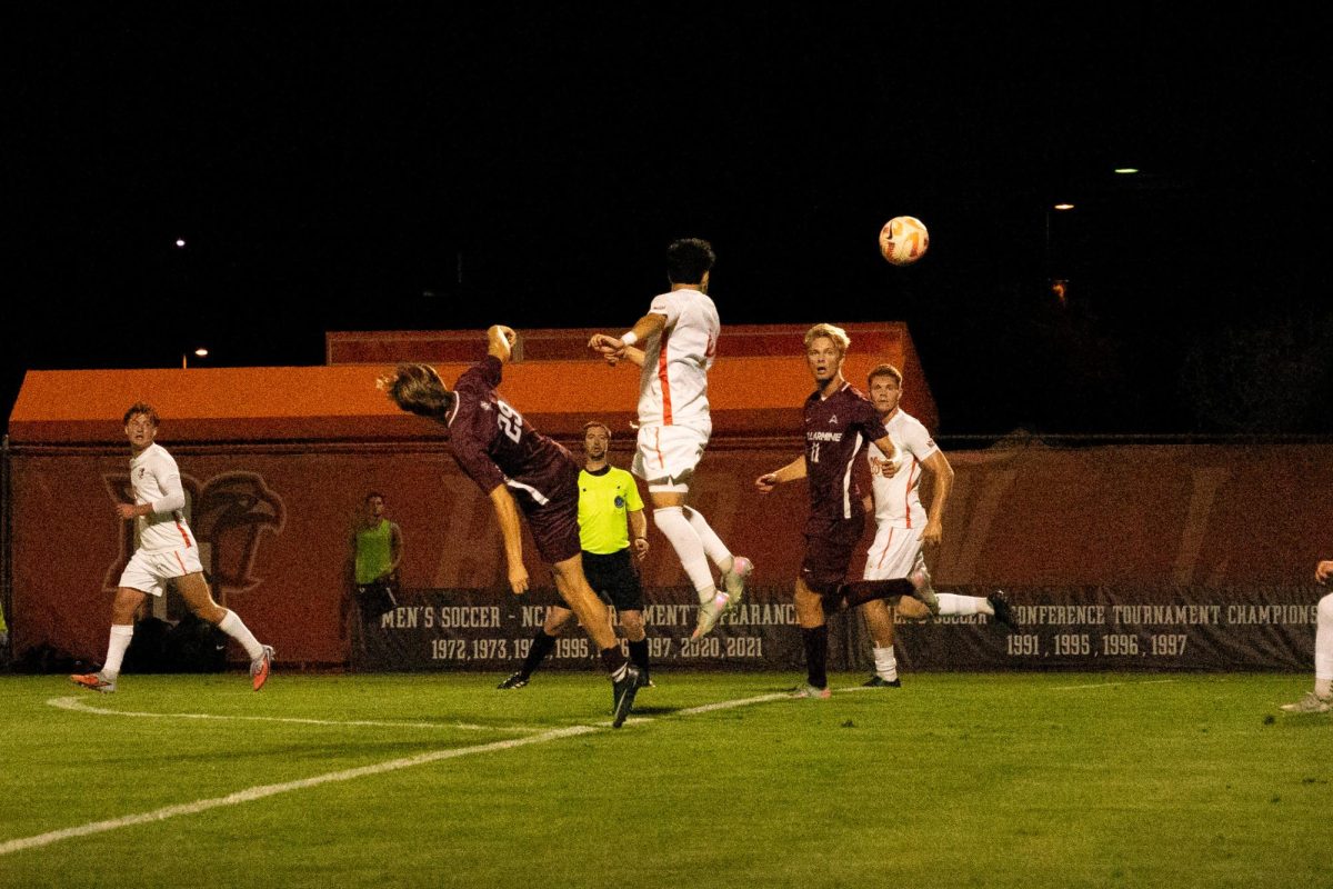 Bowling Green, OH - Falcons junior midfielder Anthony Hernandez (10) goes for a header at Cochrane Stadium in Bowling Green, Ohio.