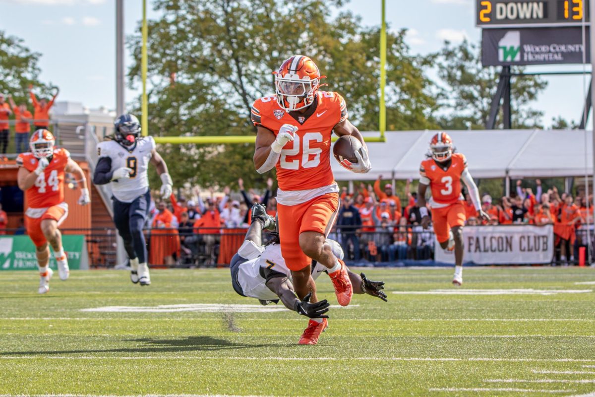 Bowling Green, OH - Falcons redshirt freshman running back Cameron Pettaway (26) catches and out runs the Rockets defense for the Falcons third touchdown of the day at Doyt L. Perry Stadium in Bowling Green, Ohio.