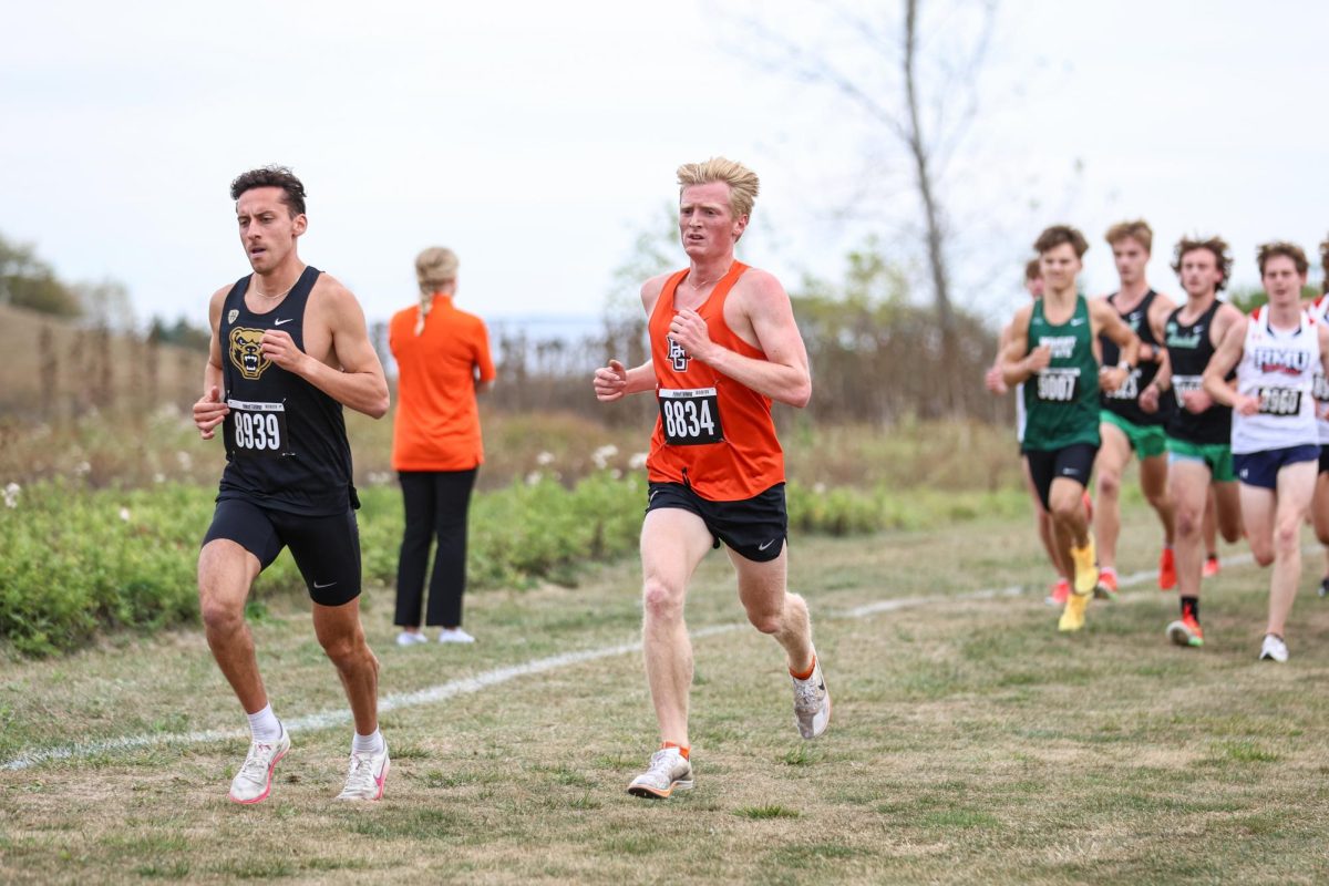 Bowling Green, OH - Falcons junior Micah Bentley runs at the Mel Brodt Cross Country Course in Bowling Green, Ohio.