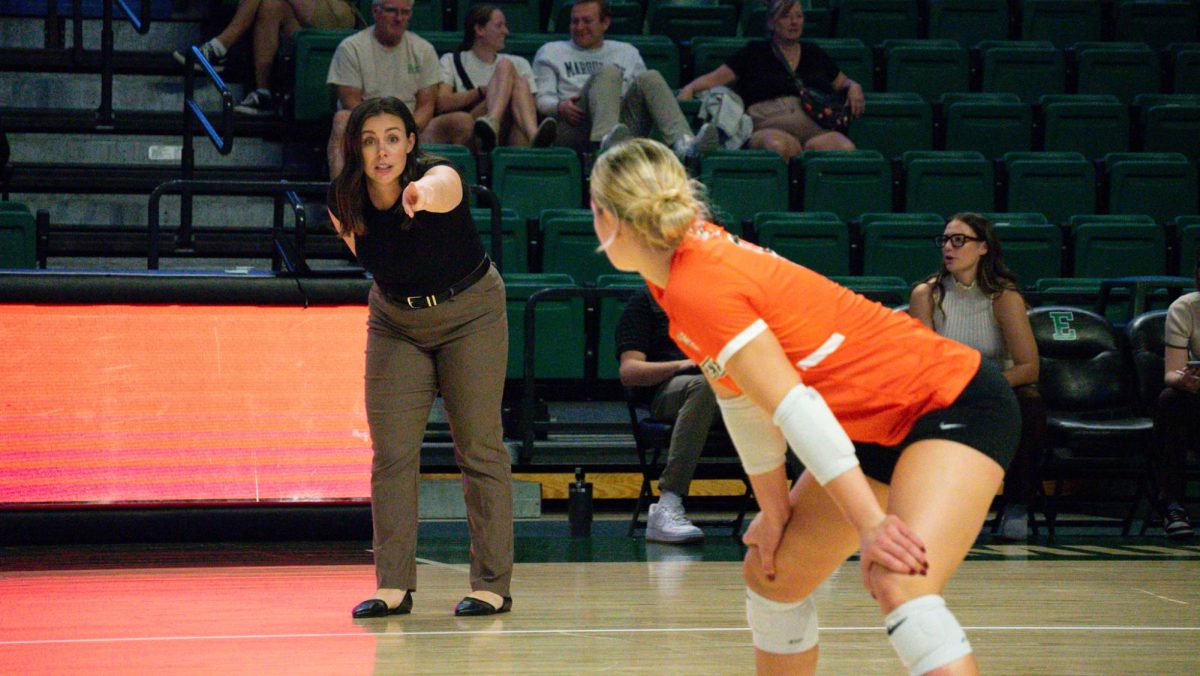 Ypsilanti, MI - Falcons sophomore defensive specialist Avery Anders (3) listens to head coach Alex DelPiombo at the George Gervin GameAbove Center in Ypsilanti, Michigan.