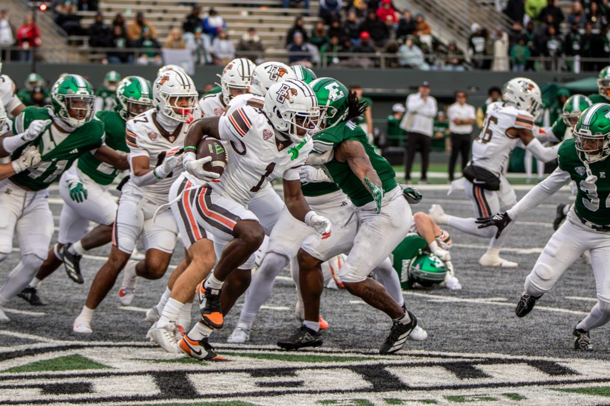 Ypsilanti, MI - Falcons sophomore wide receiver Allen Middleton (1) returns the ball for the Falcons last drive of the game against the Eastern Michigan Eagles at Rynearson Stadium in Ypsilanti, Michigan.
