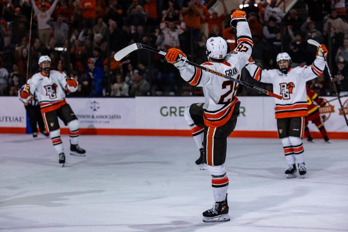  Bowling Green, OH - Falcons senior forward Jaden Grant (28) flies like a Falcon after his goal at Slater Family Ice Arena in Bowling Green, Ohio.
