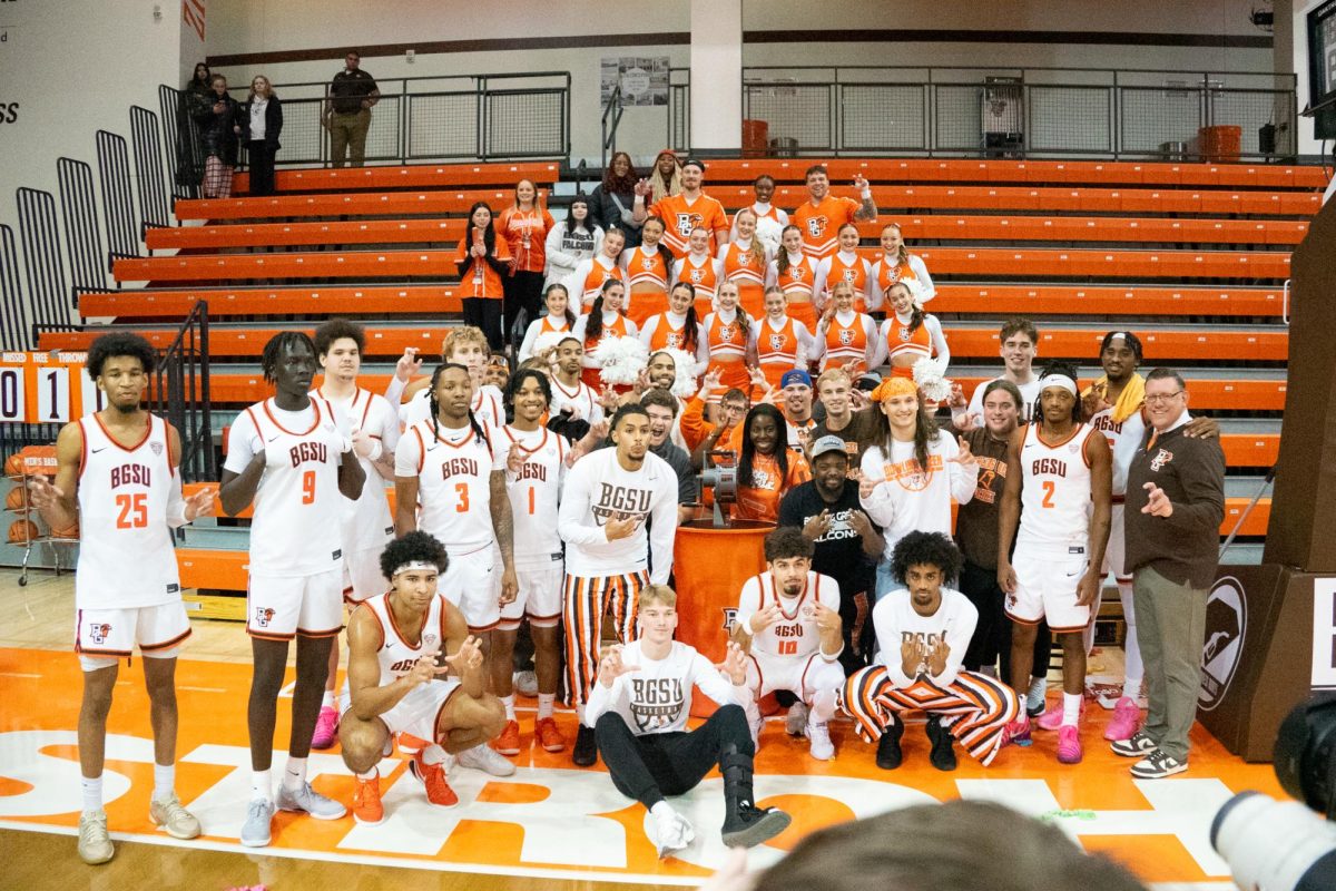 Bowling Green, OH - The Falcons men's basketball team poses after their win against the Le Moyne Dolphins at the Stroh Center in Bowling Green, Ohio.