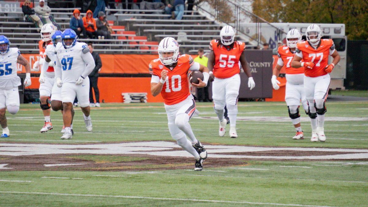 Bowling Green, OH - Falcons redshirt freshman quarterback Hunter Najm (10) runs the ball up the middle at Doyt L. Perry Stadium in Bowling Green, Ohio.