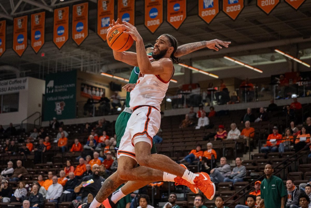 Bowling Green, OH - Falcons senior guard Javon Ruffin (11) going up for the layup at the Stroh Center in Bowling Green, Ohio.