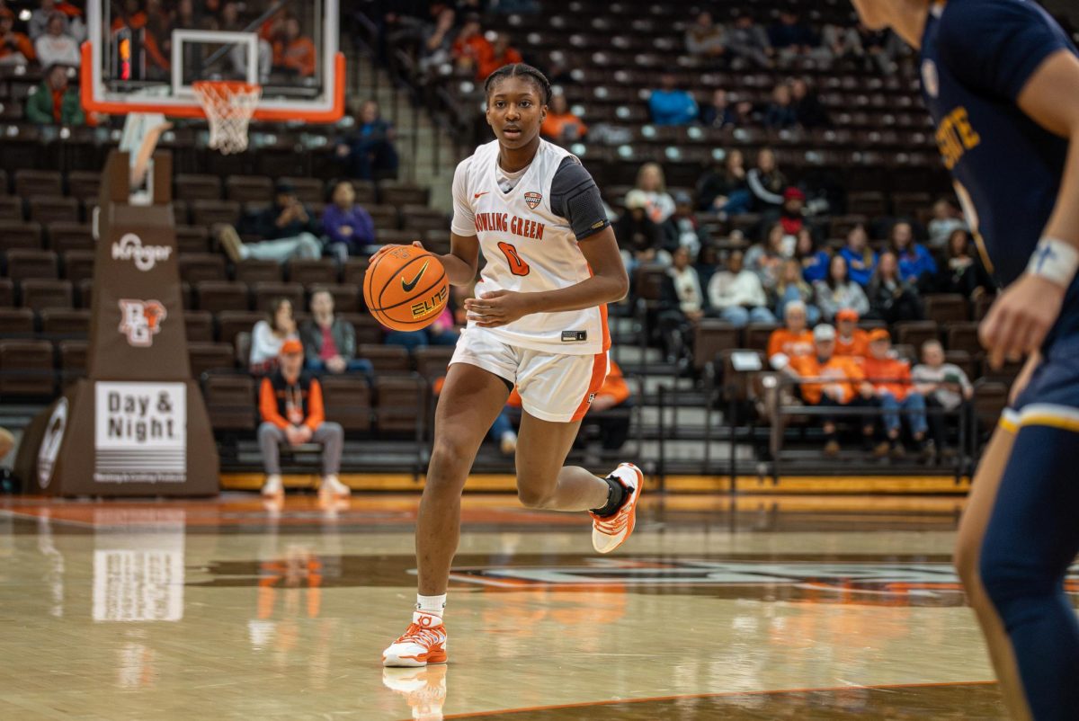Bowling Green, OH - Falcons sophomore guard Laila Harrison (0) bringing the ball into the zone at the Stroh Center in Bowling Green, Ohio.