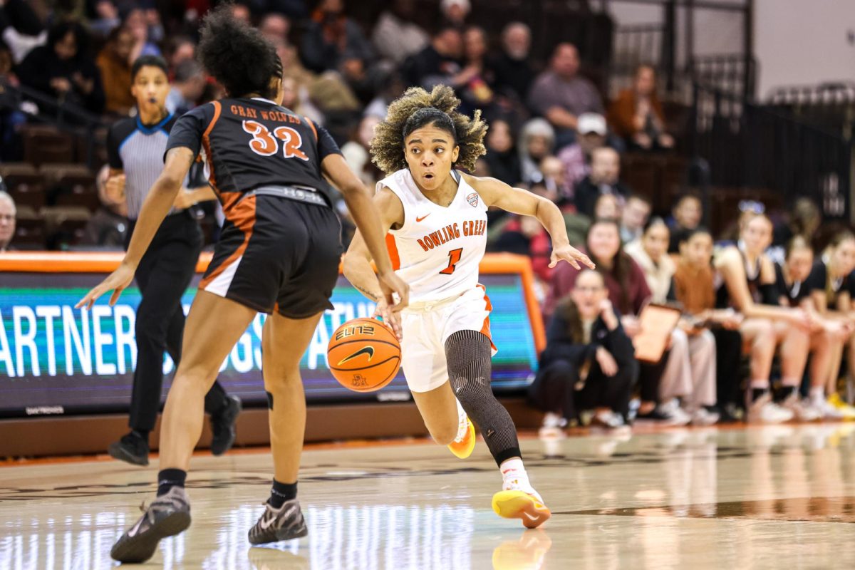 Bowling Green, OH - Falcons senior guard Kaia Woods (1) bolts down the court at the Stroh Center in Bowling Green, Ohio.