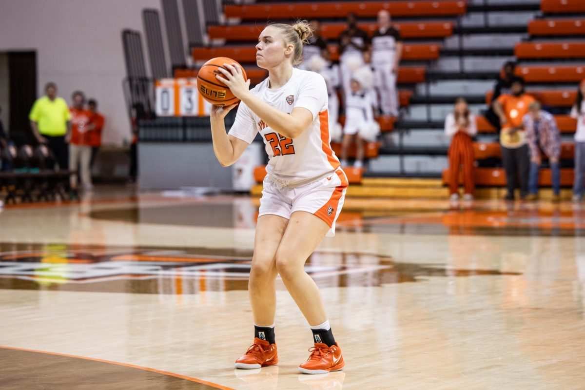 Bowling Green, OH - Falcons sophomore forward Lauren Gerken (22) takes an uncontested three during a game between the Defiance Yellow Jackets and the Bowling Green Falcons at the Stroh Center in Bowling Green, Ohio.
