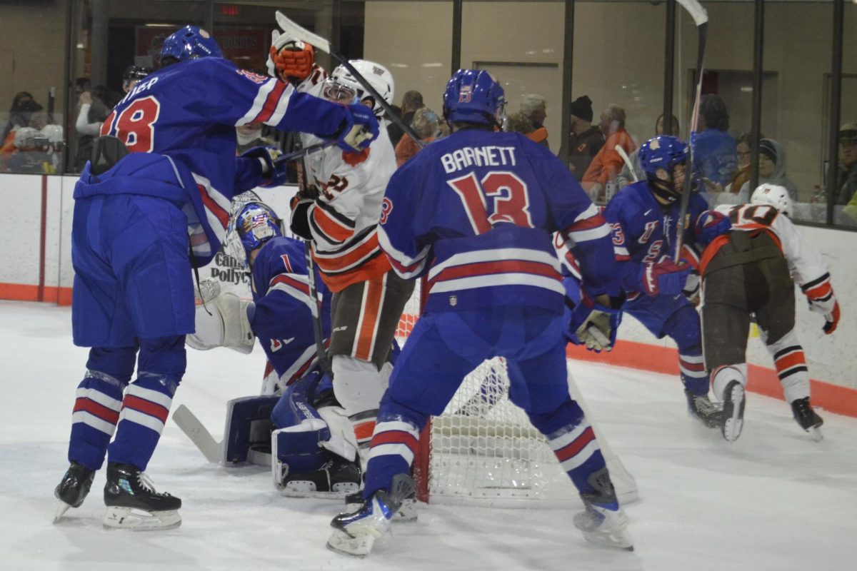 Bowling Green, OH - A scuffle in front of the U-18 Team USA net at the Slater Family Ice Arena in Bowling Green, Ohio.