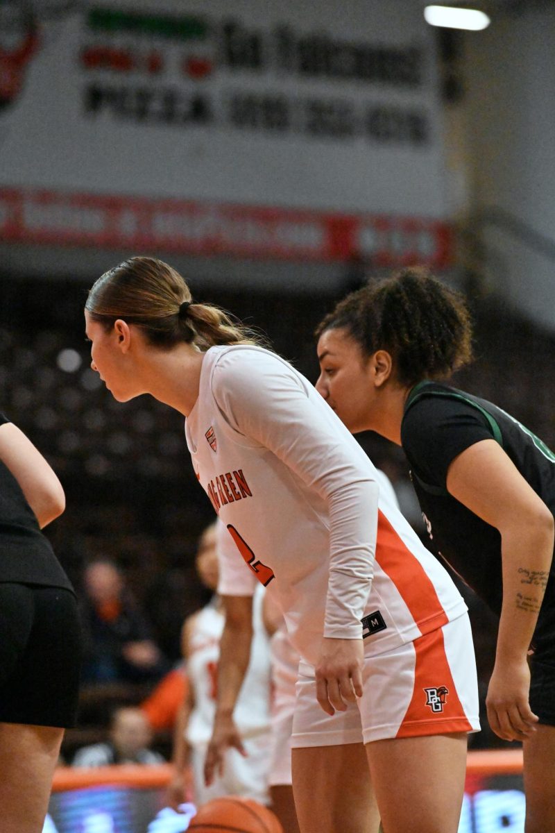 Bowling Green, OH - Falcons senior guard Emily Siesel (2) preparing to guard her opponent at the Stroh Center in Bowling Green, Ohio.