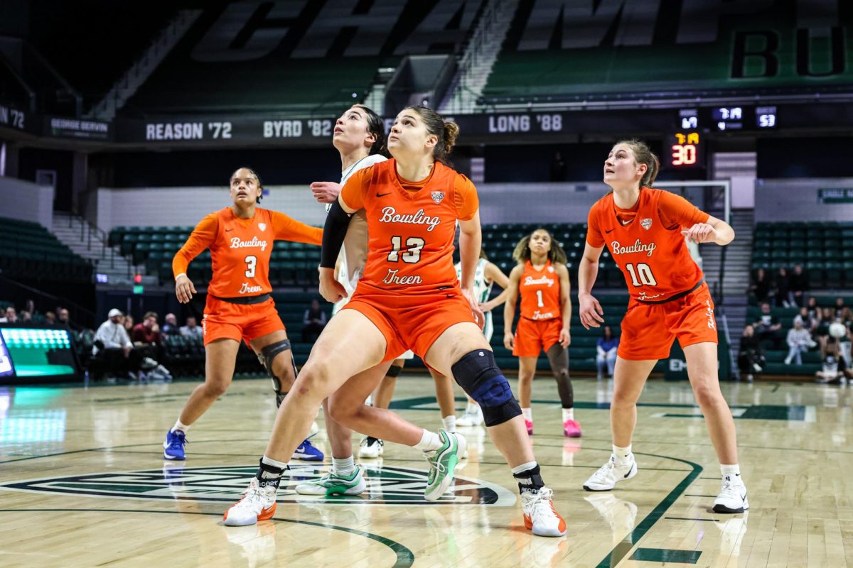 Ypsilanti, MI - Falcons redshirt freshman forward Sofia Moschen (13) boxes out a EMU Eagle at the George Gervin GameAbove Center in Ypsilanti, Michigan.