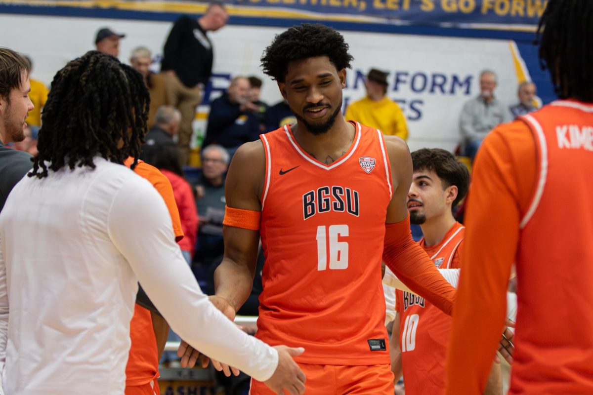  Kent, OH - Falcons senior forward Troy Glover II (16) is introduced to the game between the Bowling Green Falcons and the Kent State Golden Flashes at the M.A.C. Center in Kent, Ohio.