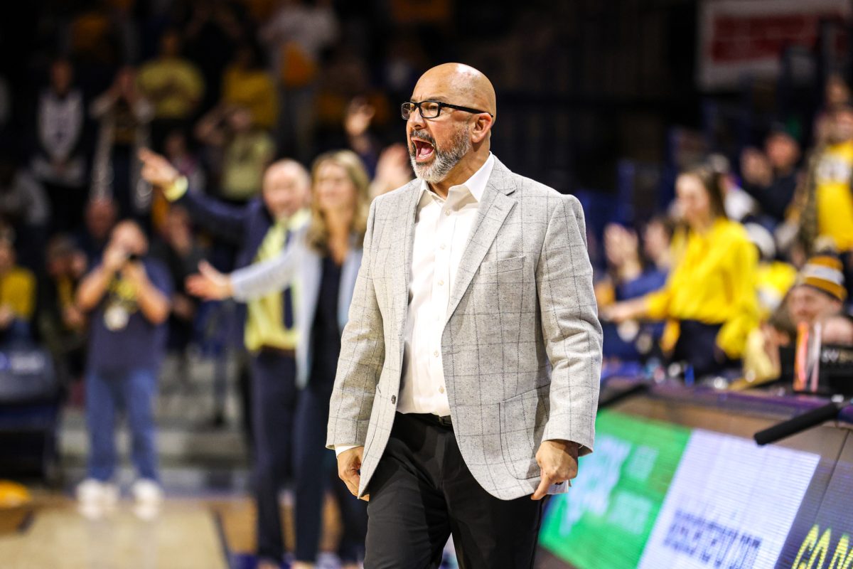 Toledo, OH - Falcons women’s basketball head coach Fred Chmiel yells out a plan in the last seconds of the Battle of I-75 at the John F. Savage Arena in Toledo, Ohio.