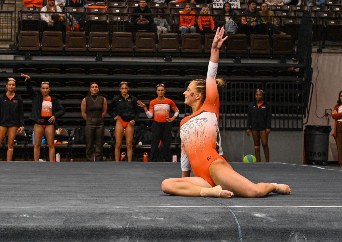 Bowling Green, OH - Falcons sophomore Kayla Shaw preparing to turn on the beam at the Stroh Center in Bowling Green, Ohio. 