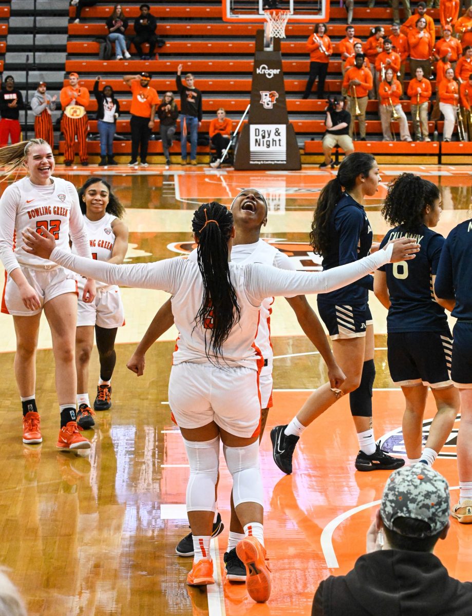 Bowling Green, OH - Falcons sophomore guard Johnea Donahue (3) celebrating with her teammate junior Joniyah Bland-Fitzpatrick (8) after making a play at their home court, the Stroh Center in Bowling Green, Ohio.