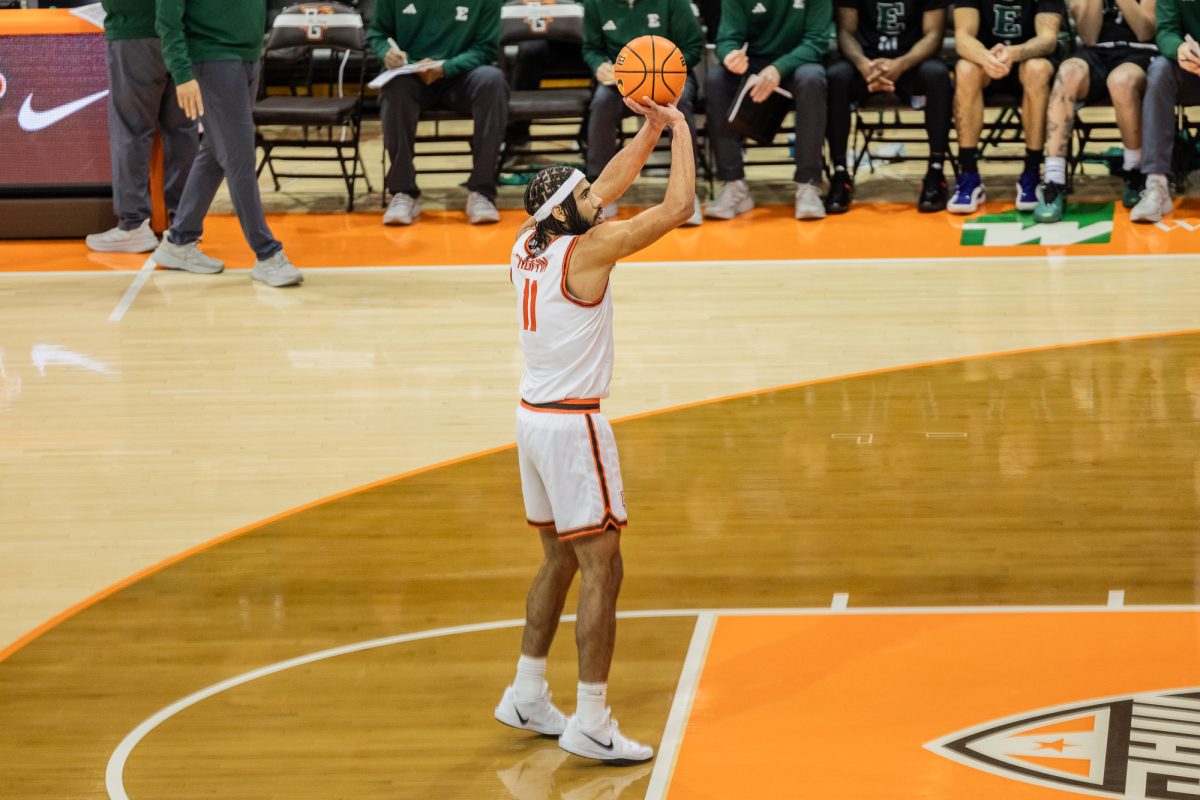 Bowling Green, OH - Falcons senior guard Javon Ruffin (11) takes a free throw after a personal foul during a game between the Eastern Michigan Eagles and the Bowling Green Falcons at the Stroh Center in Bowling Green, Ohio.