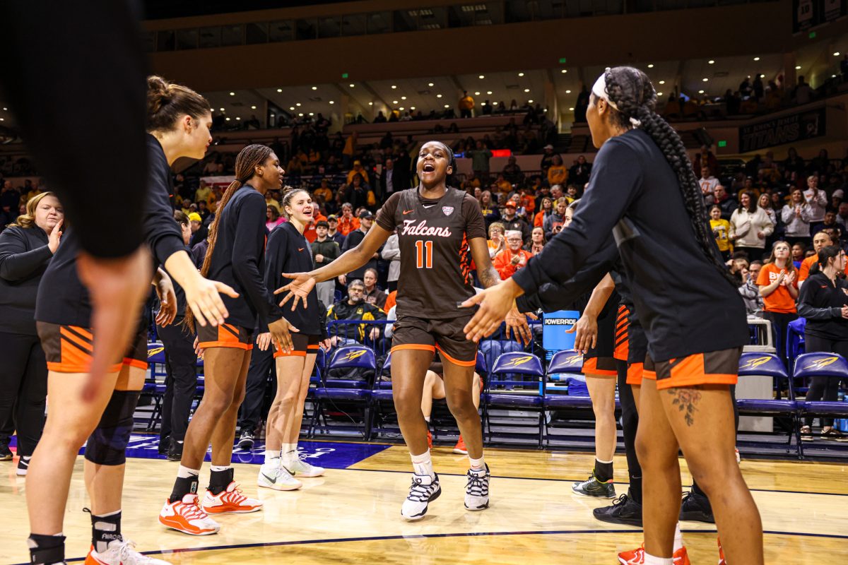 Toledo, OH - Falcons junior forward Taya Ellis (11) is introduced at the John F. Savage Arena in Toledo, Ohio ahead of a Battle of I-75 contest.